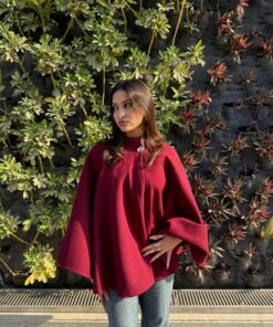 The burgundy cape